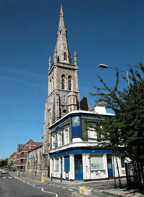 Church and pub, Cable Street, July 2003