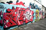 Graffiti, forecourt in Brick Lane, December 2002